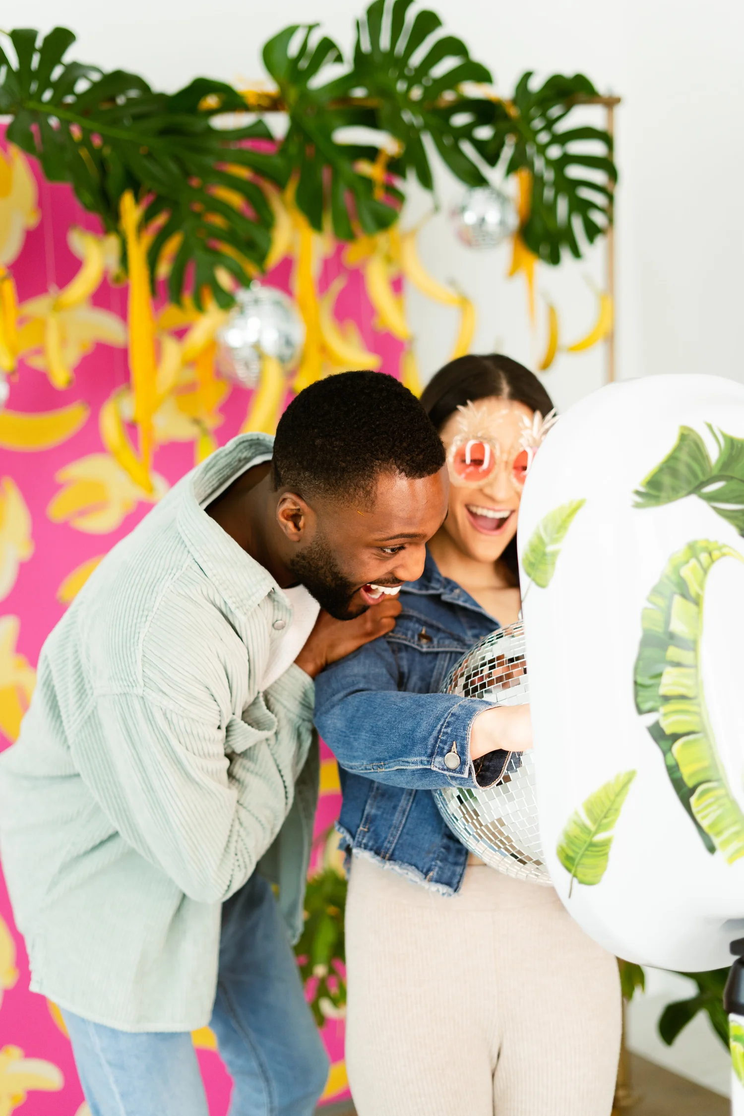 Coworkers posing in a Bend, Oregon corporate event photo booth