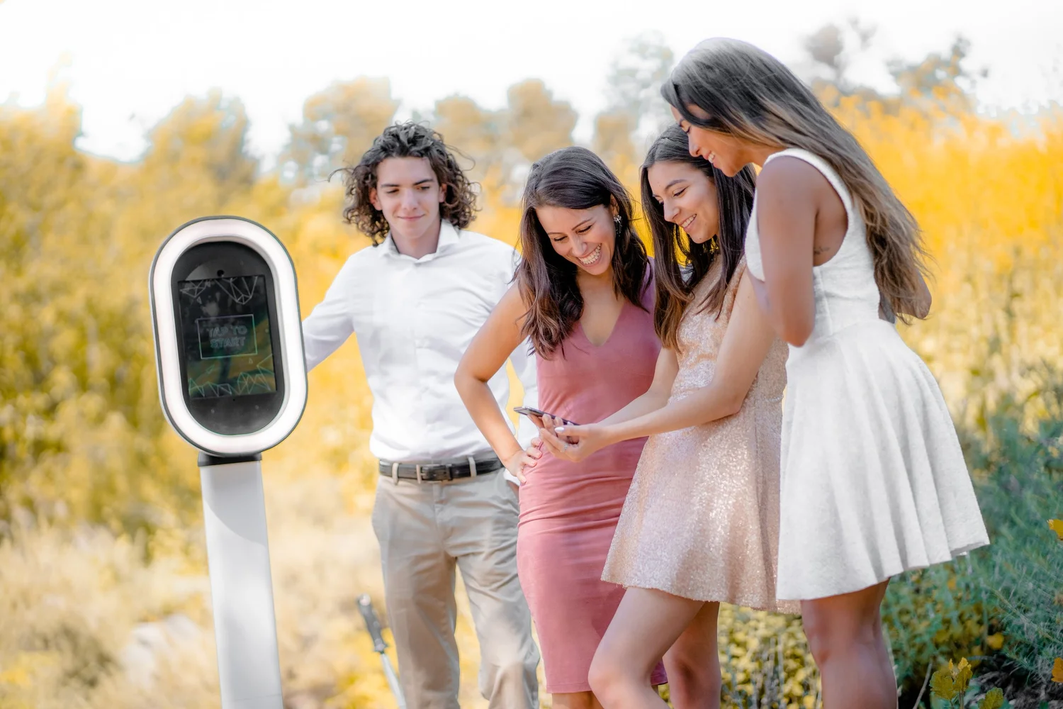 Wedding guests using a Central Oregon photo booth rental