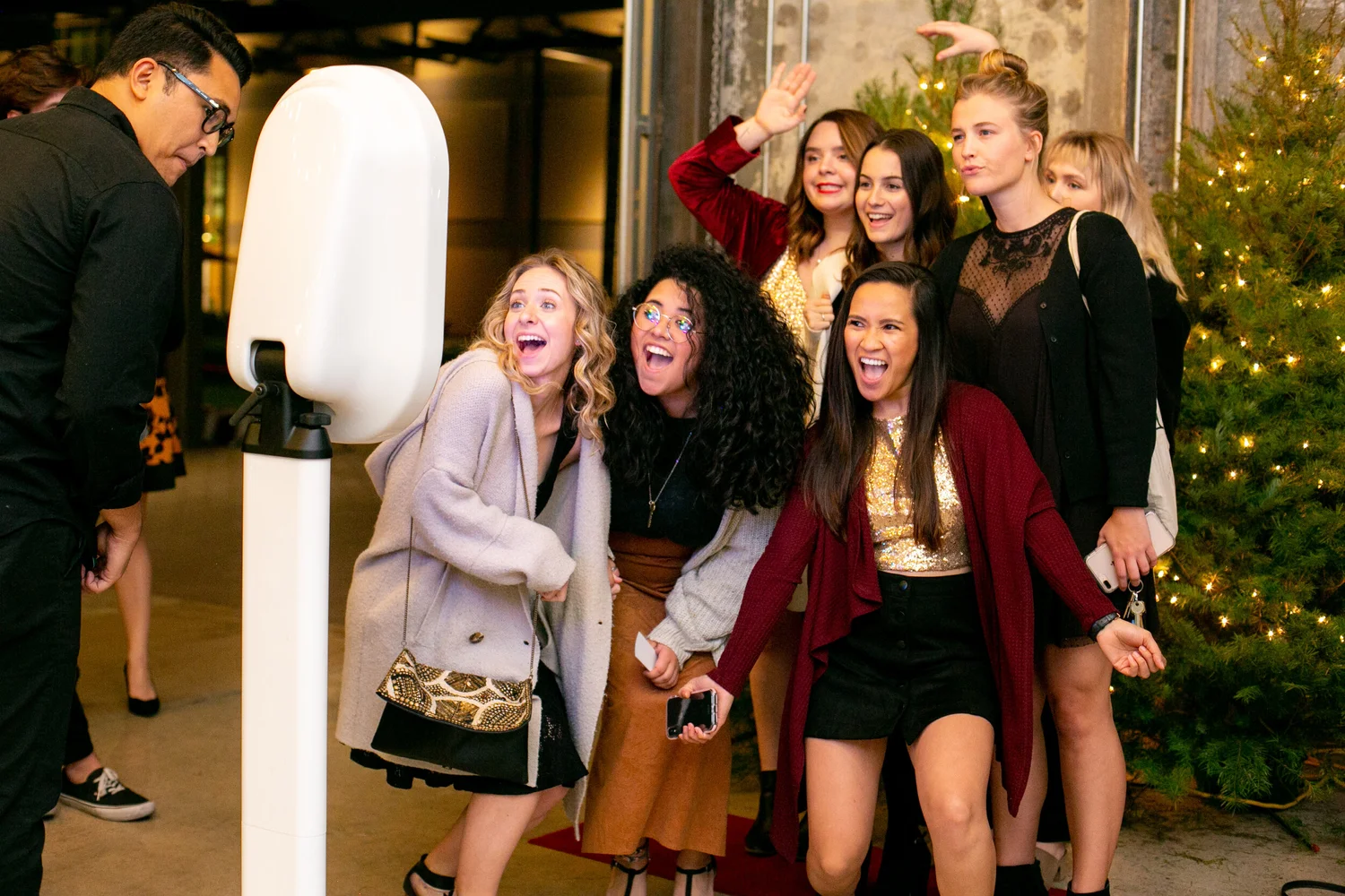 Holiday party photo booth rental in Bend, Oregon with festive props