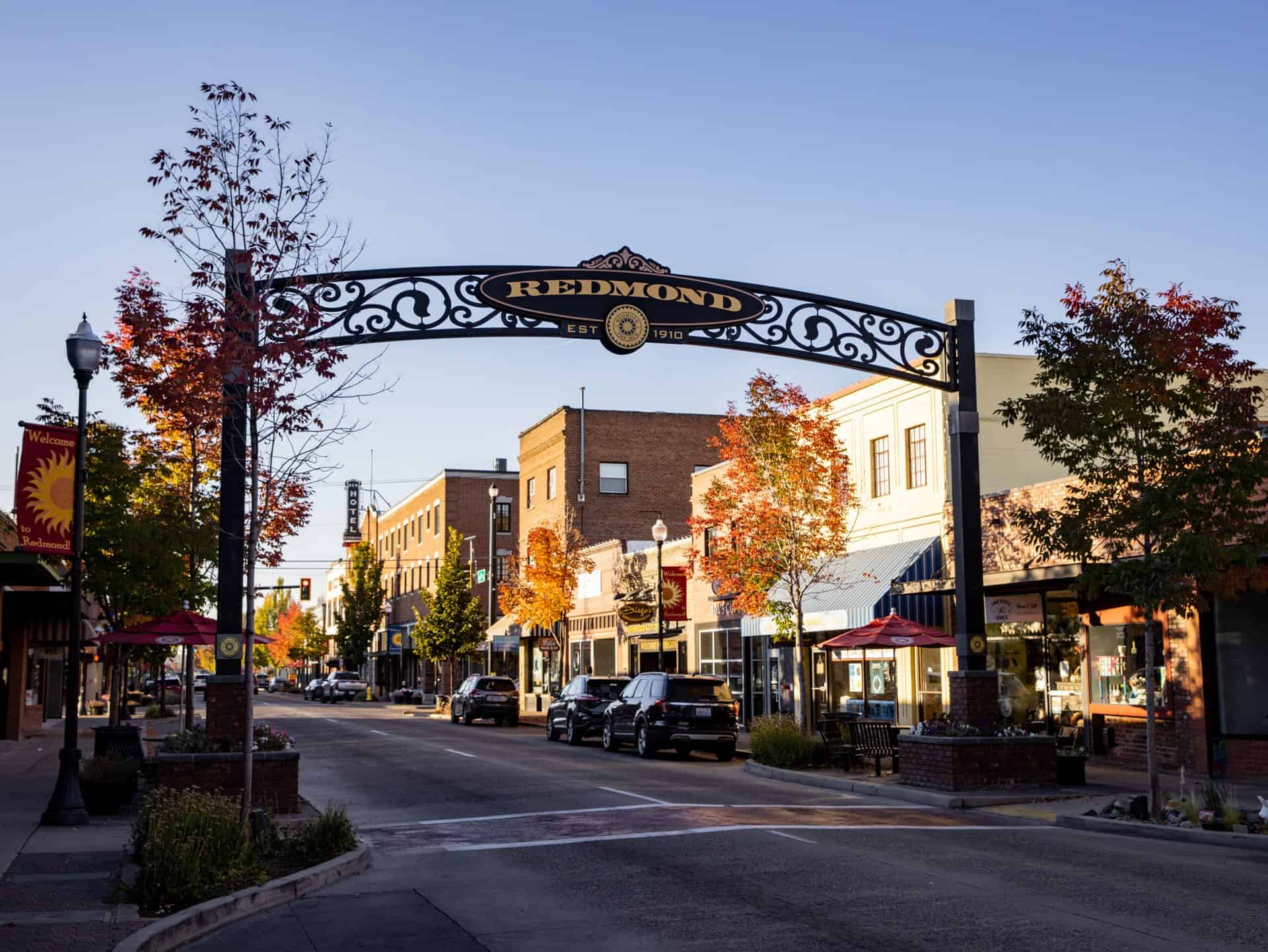 Historic downtown Redmond, Oregon archway over Sixth Street at golden hour
