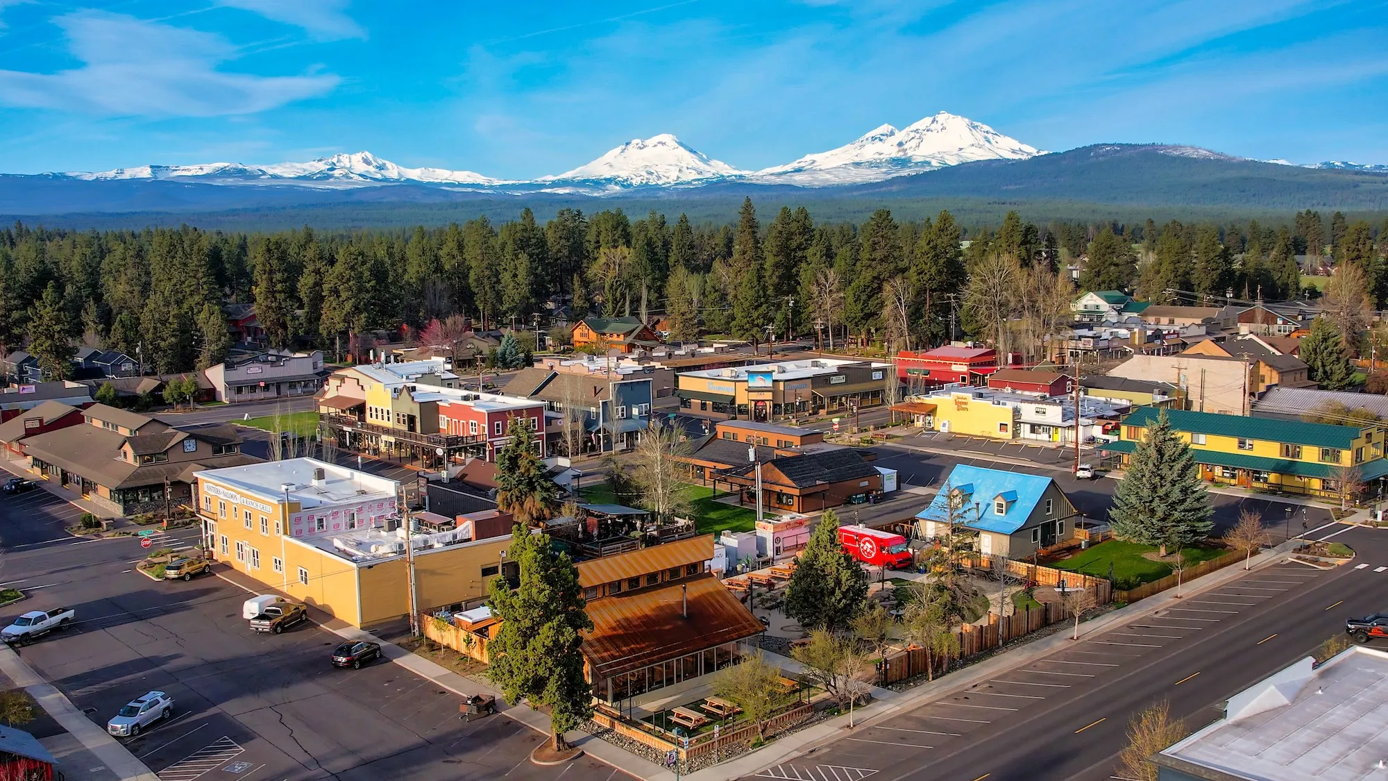 Downtown Sisters, Oregon with snow-capped Three Sisters mountain peaks in the background